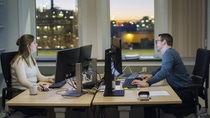 Two people with expertise in business sciences in an BASF Ludwigshafen office.